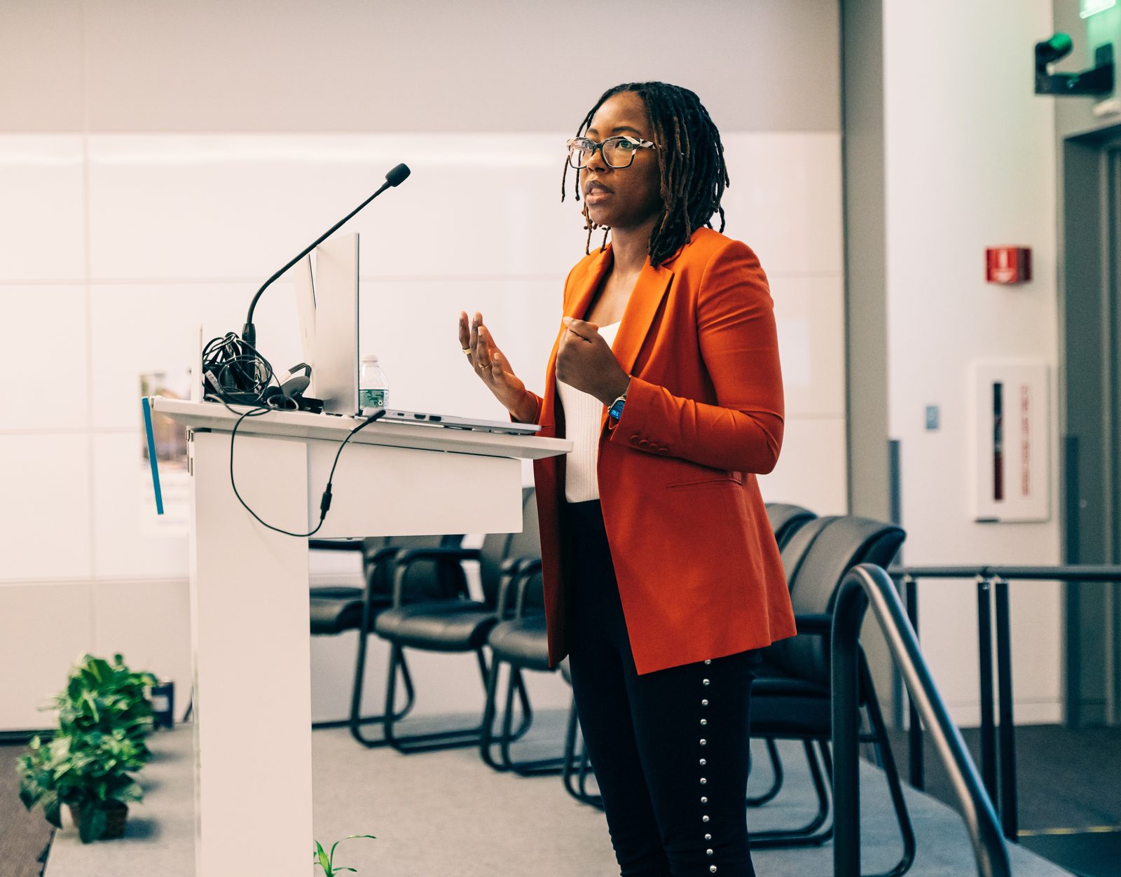 Sheila Phicil speaking at a podium